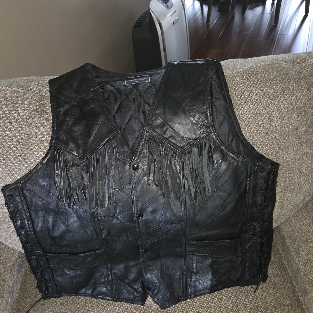 Black Leather  Rebel Fringe Vest.. Size 4X There are a few flaws see photos